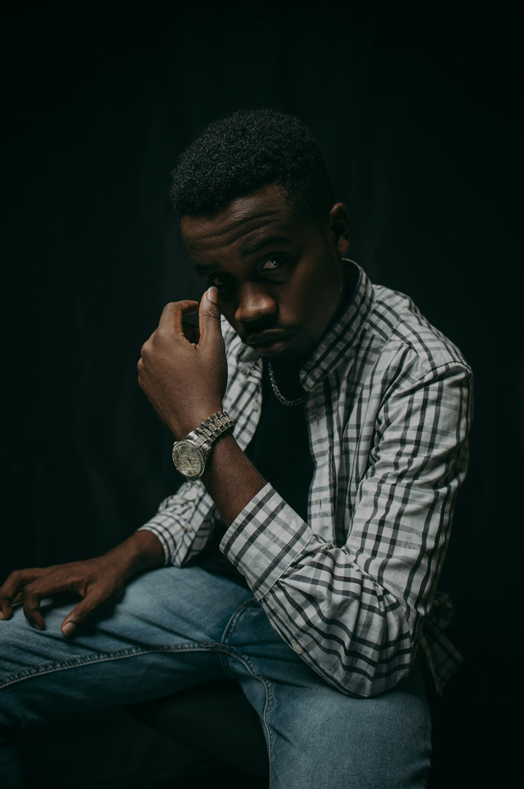 Portrait of a Black man in a casual shirt